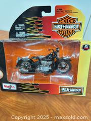 MaxSold Auction: Harley Davidson toy model motorcycle - Cocoa (Florida, USA) SELLER MANAGED Estate Sale Online Auction - Broadcast Court.