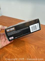 MaxSold Auction: Harley Davidson toy model motorcycle - Cocoa (Florida, USA) SELLER MANAGED Estate Sale Online Auction - Broadcast Court.