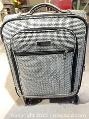 MaxSold Auction: London Fog Rolling Carry-on Bag - Cocoa (Florida, USA) SELLER MANAGED Estate Sale Online Auction - Broadcast Court.