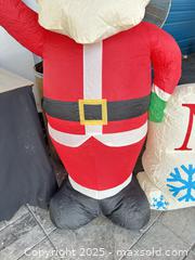 MaxSold Auction: Merry Christmas Inflatable Santa - Cocoa (Florida, USA) SELLER MANAGED Estate Sale Online Auction - Broadcast Court.
