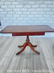 MaxSold Auction: Small antique clawfoot drop leaf table - Cocoa (Florida, USA) SELLER MANAGED Estate Sale Online Auction - Broadcast Court.