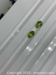 MaxSold Auction: Two(0.90ctw)NATURAL! Vibrant Lime Green Peridots - Toronto (Ontario, Canada) SELLER MANAGED Commercial Liquidation Online Auction - Queen Street East