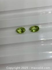 MaxSold Auction: Two(0.90ctw)NATURAL! Vibrant Lime Green Peridots - Toronto (Ontario, Canada) SELLER MANAGED Commercial Liquidation Online Auction - Queen Street East