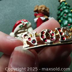 MaxSold Auction: 4 Christmas Brooches Pins Noel Christmas Tree Santa - Grimsby (Ontario, Canada) SELLER MANAGED Reseller Online Auction - Mountview Avenue