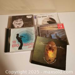 MaxSold Auction: 5 Mixed CDs - Grimsby (Ontario, Canada) SELLER MANAGED Reseller Online Auction - Mountview Avenue