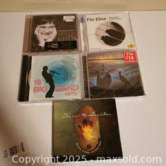 MaxSold Auction: 5 Mixed CDs - Grimsby (Ontario, Canada) SELLER MANAGED Reseller Online Auction - Mountview Avenue