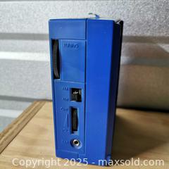 MaxSold Auction: Canon Sure Shot Owl Camera and Polaroid 600 Plus Radio - Grimsby (Ontario, Canada) SELLER MANAGED Reseller Online Auction - Mountview Avenue