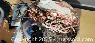 MaxSold Auction: Cookie Tin with Mixed Jewelry Bits - Grimsby (Ontario, Canada) SELLER MANAGED Reseller Online Auction - Mountview Avenue