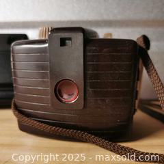 MaxSold Auction: Kodak Brownie Holiday Flash Camera and Kodak TeleDisc - Grimsby (Ontario, Canada) SELLER MANAGED Reseller Online Auction - Mountview Avenue