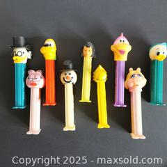 MaxSold Auction: Mixed Set of 9 Retro Pez Candy Dispensers - Grimsby (Ontario, Canada) SELLER MANAGED Reseller Online Auction - Mountview Avenue