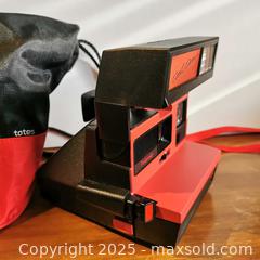 MaxSold Auction: Polaroid Cool Cam Camera with Carrying Bag - Grimsby (Ontario, Canada) SELLER MANAGED Reseller Online Auction - Mountview Avenue