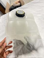 MaxSold Auction: Translucent Coolant Expansion/Overflow Reservoir Tank - Toronto (Ontario, Canada) SELLER MANAGED Downsizing Online Auction - Duncan Mills Road (STORAGE)