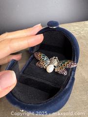 MaxSold Auction: SENSATIONAL! High-Quality Sterling Silver, Enamel, Pearl &#38; Marcasite Moth Brooch - Victoria (British Columbia, Canada) PARTNER MANAGED Estate Sale Online Auction PART 3 - Bay Street