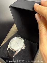 MaxSold Auction: SILVER MAPLE LEAF: Men&#39;s Real Silver Coin Wristwatch  - Victoria (British Columbia, Canada) PARTNER MANAGED Estate Sale Online Auction PART 3 - Bay Street