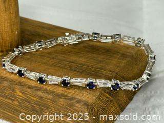 MaxSold Auction: JJI 925 Sterling Silver blue and white stones tennis bracelet - Menlo Park (California, USA) SELLER MANAGED Downsizing Online Auction - Henderson Place