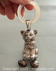 MaxSold Auction: Antique British STERLING Silver &#38; Mother of Pearl Cat Baby&#39;s Rattle - Hallmarked  - Toronto (Ontario, Canada) PARTNER MANAGED Reseller Online Auction - Queen Street West.