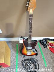 MaxSold Auction: Fender Stratocaster Electric Guitar  - Prince Edward (Ontario, Canada) PARTNER MANAGED Downsizing Online Auction - Conger Drive