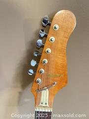MaxSold Auction: Fender Stratocaster Electric Guitar  - Prince Edward (Ontario, Canada) PARTNER MANAGED Downsizing Online Auction - Conger Drive