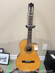 MaxSold Auction: Ibanez Classical Acoustic/Electric Guitar   - Prince Edward (Ontario, Canada) PARTNER MANAGED Downsizing Online Auction - Conger Drive