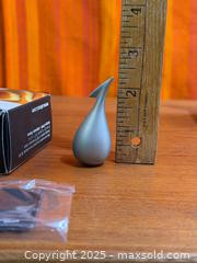 MaxSold Auction: ALESSI &#39;Apostrophe&#39; Orange Peeler - NiB - Hamilton (Ontario, Canada) SELLER MANAGED Estate Sale Online Auction - Gertrude Street