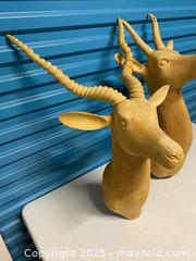 MaxSold Auction: Pair of Carved Wooden Antelope Wall Mount Sculptures – Approx. 28” &#38; 24” – Solid Wood - Vancouver (British Columbia, Canada) SELLER MANAGED Reseller Online Auction - East 7th Avenue (STORAGE)