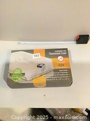 MaxSold Auction: Combination Lock Thermostat Cover, Translucent Plastic - Ottawa (Ontario, Canada) SELLER MANAGED Downsizing Online Auction - Oaklawn Crescent