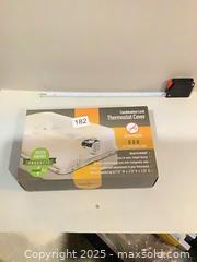 MaxSold Auction: Combination Lock Thermostat Cover, Translucent Plastic - Ottawa (Ontario, Canada) SELLER MANAGED Downsizing Online Auction - Oaklawn Crescent