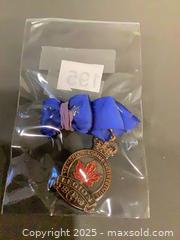 MaxSold Auction: Royal Canadian Legion Shot Put Medal with Blue Ribbon - Ottawa (Ontario, Canada) SELLER MANAGED Downsizing Online Auction - Oaklawn Crescent