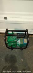 MaxSold Auction: Vintage green Coleman power mate generator  - Walworth (New York, USA) SELLER MANAGED Downsizing Online Auction - High Street
