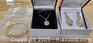 MaxSold Auction: Lot of 3 Jewelry Pieces: Bangle, Pendant Necklace, Dangle Earrings - Toronto (Ontario, Canada) SELLER MANAGED Reseller Online Auction - Curity Avenue
