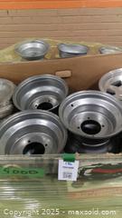 MaxSold Auction: Pallet of Assorted Small Steel rims, other parts ( possibly shocks) - Toronto (Ontario, Canada) SELLER MANAGED Reseller Online Auction - Curity Avenue