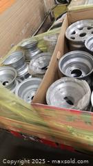 MaxSold Auction: Pallet of Assorted Small Steel rims, other parts ( possibly shocks) - Toronto (Ontario, Canada) SELLER MANAGED Reseller Online Auction - Curity Avenue