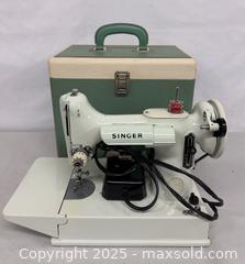 MaxSold Auction: ** RARE ** White Singer Featherweight 221K Sewing Machine in Original Case &#38; Acces works. - Toronto (Ontario, Canada) PARTNER MANAGED Reseller Online Auction - Queen Street West