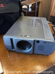 MaxSold Auction: EIKI LC-NB2 Notebook Projector - Garden City (Georgia, USA) SELLER MANAGED Downsizing Online Auction - Bryce Industrial Drive