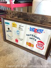 MaxSold Auction: Framed Embroidered/Tapestry Sampler with Corporate Logos - Garden City (Georgia, USA) SELLER MANAGED Downsizing Online Auction - Bryce Industrial Drive