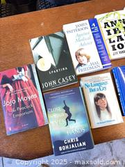 MaxSold Auction: Lot of 13 Paperback Fiction Books - Garden City (Georgia, USA) SELLER MANAGED Downsizing Online Auction - Bryce Industrial Drive