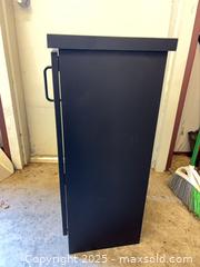 MaxSold Auction: Tall Narrow Black Storage Cabinet with Shelves and Door - Garden City (Georgia, USA) SELLER MANAGED Downsizing Online Auction - Bryce Industrial Drive