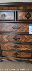 MaxSold Auction: Traditional 5-Drawer Wood Tall Dresser with Herringbone Front - Lakeland (Florida, USA) PARTNER MANAGED Estate Sale Online Auction - Canyon Lake Point
