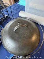 MaxSold Auction: 2 Pan/Pot Racks with Cast Iron Pot & Lid - Fort Washington (Maryland, USA) SELLER MANAGED Estate Sale Online Auction - Hatton Point Road