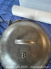 MaxSold Auction: 2 Pan/Pot Racks with Cast Iron Pot & Lid - Fort Washington (Maryland, USA) SELLER MANAGED Estate Sale Online Auction - Hatton Point Road