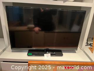 MaxSold Auction: Vizio Flat Screen TV – 35” Length – With Remote &#38; Stand - Fort Washington (Maryland, USA) SELLER MANAGED Estate Sale Online Auction - Hatton Point Road