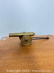 MaxSold Auction: MCM stylized brass cannon - Vancouver (British Columbia, Canada) SELLER MANAGED Reseller Online Auction - Main Street