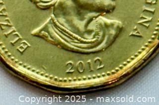 MaxSold Auction: Canada 2012 Loonie — Grey Cup 100th A - Surrey (British Columbia, Canada) SELLER MANAGED Downsizing Online Auction -  75a Avenue