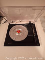 MaxSold Auction: USB Turntable and 45's From 1970's and 1980's A - Surrey (British Columbia, Canada) SELLER MANAGED Downsizing Online Auction -  75a Avenue