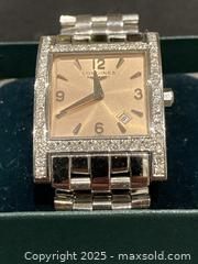 MaxSold Auction: Genuine Longines White Stainless Steel Diamond DolceVita Women&#39;s Wristwatch (24 mm). - Mississauga (Ontario, Canada) SELLER MANAGED Reseller Online Auction - Greenbower Court