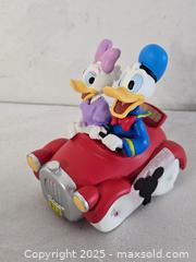 MaxSold Auction: Disney Precious Moments Donald Duck  - Riverview (Florida, USA) SELLER MANAGED Downsizing Online Auction - Holly Heath Drive