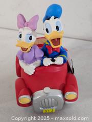 MaxSold Auction: Disney Precious Moments Donald Duck  - Riverview (Florida, USA) SELLER MANAGED Downsizing Online Auction - Holly Heath Drive