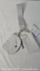 MaxSold Auction: Lululemon Dual Pouch Wristlet - Riverview (Florida, USA) SELLER MANAGED Downsizing Online Auction - Holly Heath Drive