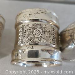 MaxSold Auction: Meridan Silver Co Boy Girl Napkin Rings - Riverview (Florida, USA) SELLER MANAGED Downsizing Online Auction - Holly Heath Drive
