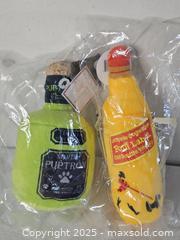 MaxSold Auction: Pair Of Liquor Bottle Dog Toys - Riverview (Florida, USA) SELLER MANAGED Downsizing Online Auction - Holly Heath Drive